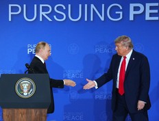 U.S. President Donald Trump (right) and Russian President Vladimir Putin attend a joint press conference after concluding their talks in Anchorage, Alaska on Aug. 15, 2025.