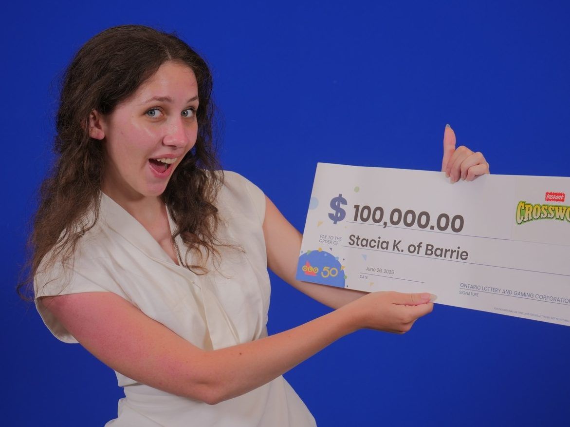 Stacia Konieczny of Barrie won $100,000 playing Instant Crossword Tripler.