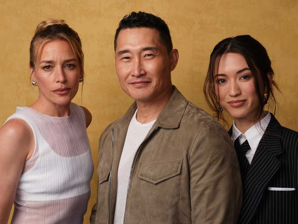 Piper Perabo, from left, Daniel Dae Kim, and Reina Hardesty pose for a portrait to promote "Butterfly" during Comic-Con International on Friday, July 25, 2025, in San Diego.