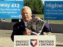 Ontario Premier Doug Ford holds up a copy of the Toronto Sun during a rant against crime during a press conference on Wednesday August 27, 2025. Screenshot: YouTube/@PremierofOntario