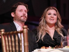 Brandon Blackstock (L) and honoree Kelly Clarkson attend Billboards Women in Music 2017 presented in partnership with FIJI Water on November 30, 2017 in Hollywood, California.
