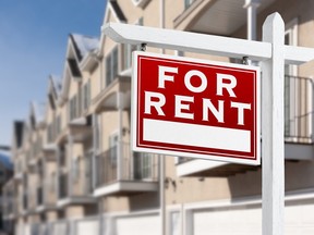A for rent sign in front of homes.