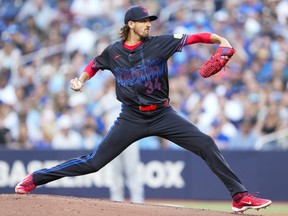 Blue Jays starting pitcher Kevin Gausman pitches against the Royals during the first inning at Rogers Center in Toronto, Friday, Aug. 1, 2025.