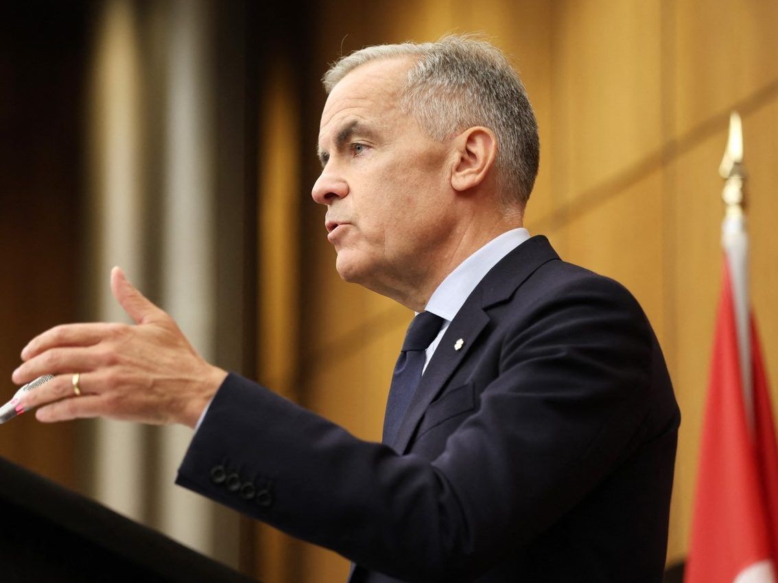Canadian Prime Minister Mark Carney speaks during a press conference at the National News Theater on Parliament Hill in Ottawa, Ontario, Canada on Friday, Aug. 22, 2025.