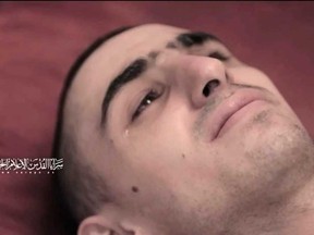 This screengrab from a video released on July 31 by Al-Quds Brigades, the armed wing of Palestinian militant group Islamic Jihad shows a hostage, identified as Rom Braslavski by the Hostages and Missing Families Forum, who was abducted to Gaza in October 2023 during the attack that sparked the Gaza war.