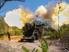 Ukrainian servicemen of the 44th artillery brigade fire a 2s22 Bohdana self-propelled howitzer towards Russian positions at the frontline in the Zaporizhzhia region, Ukraine, Wednesday, Aug. 20, 2025.