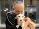 Bam Bam the emotional support dog reunites with Angel Santiago. MUST CREDIT: Bam Bam Rescue Team