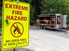 A warning sign near Squamish, British Columbia, in June. Photographer: James MacDonald/Bloomberg