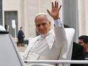Pope Leo waves as he leaves the weekly general audience at St. Peter's square in the Vatican on September 10, 2025.