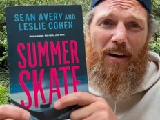 Former NHLer Sean Avery holds the book he co-wrote with Leslie Cohen, Summer Skate.
