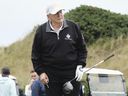 U.S. President Donald Trump hits a ball off the first tee to officially open the New Course at Trump International Golf Links in Balmedie, Aberdeenshire.