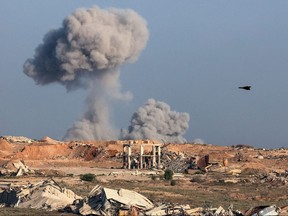 Smoke billowing during an Israeli strike.