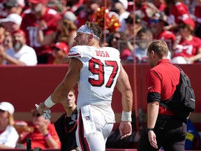 Nick Bosa of the San Francisco 49ers walks to the locker-room.