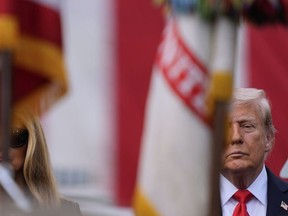 President Donald Trump and first lady Melania Trump attend a ceremony at the Pentagon to commemorate the 24th anniversary of the 9/11 attacks, Thursday, Sept. 11, 2025, in Washington.