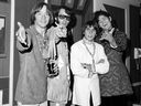 FILE - This July 6, 1967 file photo shows the musical group, The Monkees, from left, Peter Tork, Mike Nesmith, David Jones, and Micky Dolenz at a news conference at the Warwick Hotel in New York. (AP Photo/Ray Howard, file)