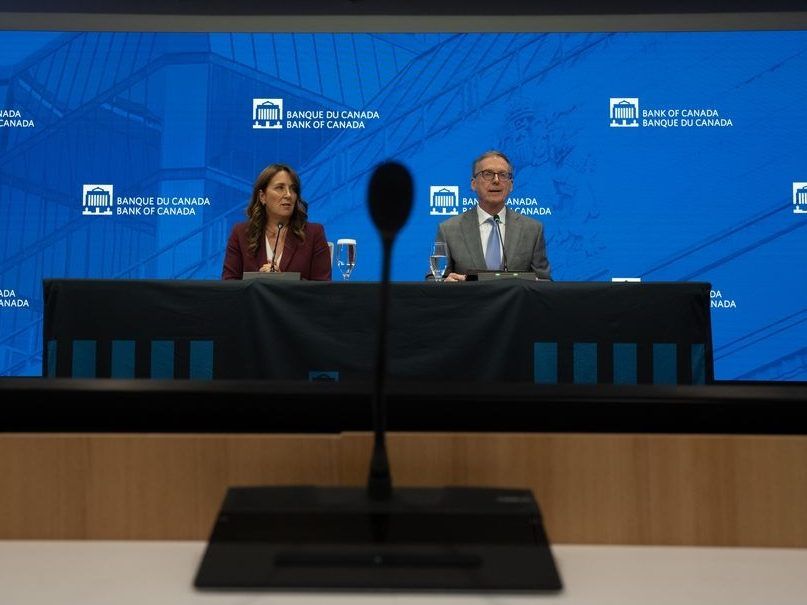 Bank of Canada Governor Tiff Macklem, right, and Senior Deputy Governor of the Bank of Canada Carolyn Rogers are seen during a news conference at the Bank of Canada in Ottawa, Wednesday, July 30, 2025. 