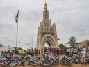 FILE - People gather at Place de l'Independence in Mali's capital Bamako, Aug. 19, 2020.