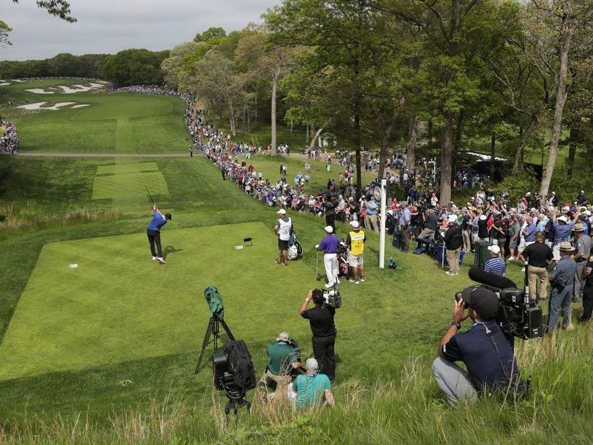 FILE - Brooks Koepka hits off the eighth tee during the final round of the PGA Championship golf tournament, Sunday, May 19, 2019, at Bethpage Black in Farmingdale, N.Y.