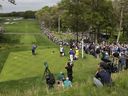 FILE - Brooks Koepka hits off the eighth tee during the final round of the PGA Championship golf tournament, Sunday, May 19, 2019, at Bethpage Black in Farmingdale, N.Y.