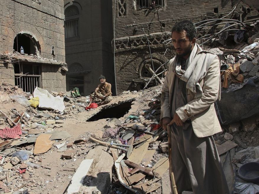 Two Yemenic men inspect the wreckage of the house, which was destroyed on Wednesday of Israeli airstrikes in San, Yemen, Saturday, September 13, 2025.