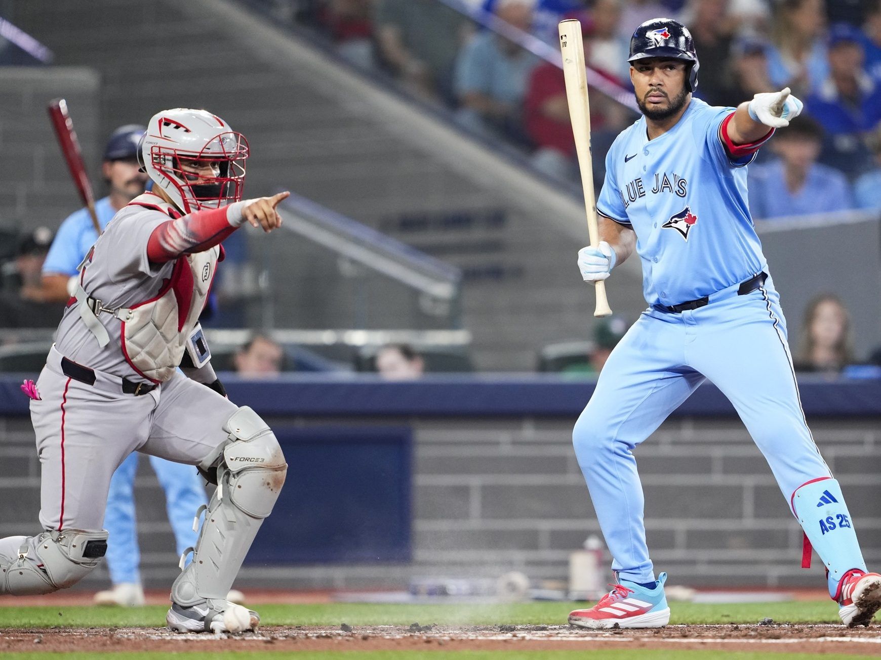 Anthony Santander of the Toronto Blue Jays calls down to the first base umpire on a check swing before being called out on strikes against the Boston Red Sox on Wednesday.

