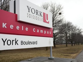 A student walks on campus at York University in Toronto on Thursday, March 20, 2025.