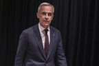 Prime Minister Mark Carney arrives at a media scrum, at the Liberal Cabinet Retreat in Toronto, Wednesday, Sept. 3, 2025.