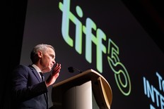 Prime Minister Mark Carney delivers remarks at the premiere of "John Candy: I Like Me" at the Toronto International Film Festival, in Toronto on Thursday, Sept. 4, 2025.