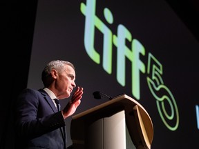 Prime Minister Mark Carney delivers remarks at the premiere of "John Candy: I Like Me" at the Toronto International Film Festival, in Toronto on Thursday, Sept. 4, 2025.