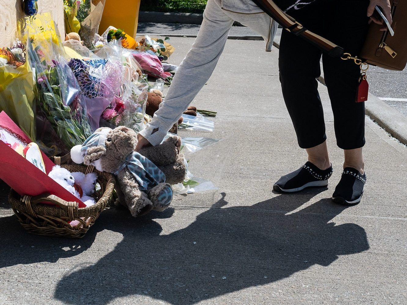 Flowers and toys are left at a daycare.
