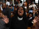 Darleen Hall worships during a service at New Mount Pilgrim Missionary Baptist Church, Sunday, Sept. 7, 2025, in Chicago.
