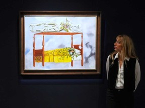 A painting by Frida Kahlo called El sueno (La cama) is displayed at Sotheby's auction rooms, the painting estimated at 40-60 million US dollars is part of a collection of surrealist masterpieces unveiled in London ahead of their sale in New York, Friday, Sept. 19, 2025.