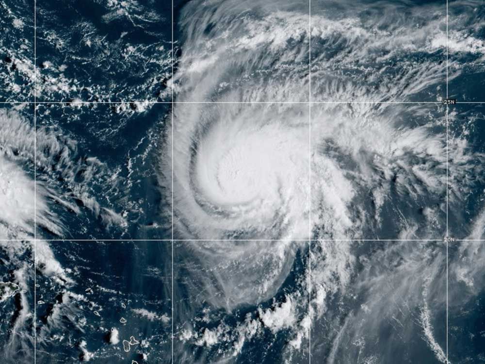 Hurricane Humberto, now a Category 4, to brush Caribbean beaches