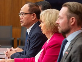 Harry Tseng, Taiwan's de factor Ambassador to Canada, joined by Liberal MP Judy Sgro and Conservative MP Michael Cooper, speaks at a press conference in Ottawa, Ont. on Monday, Sept. 22 2025
