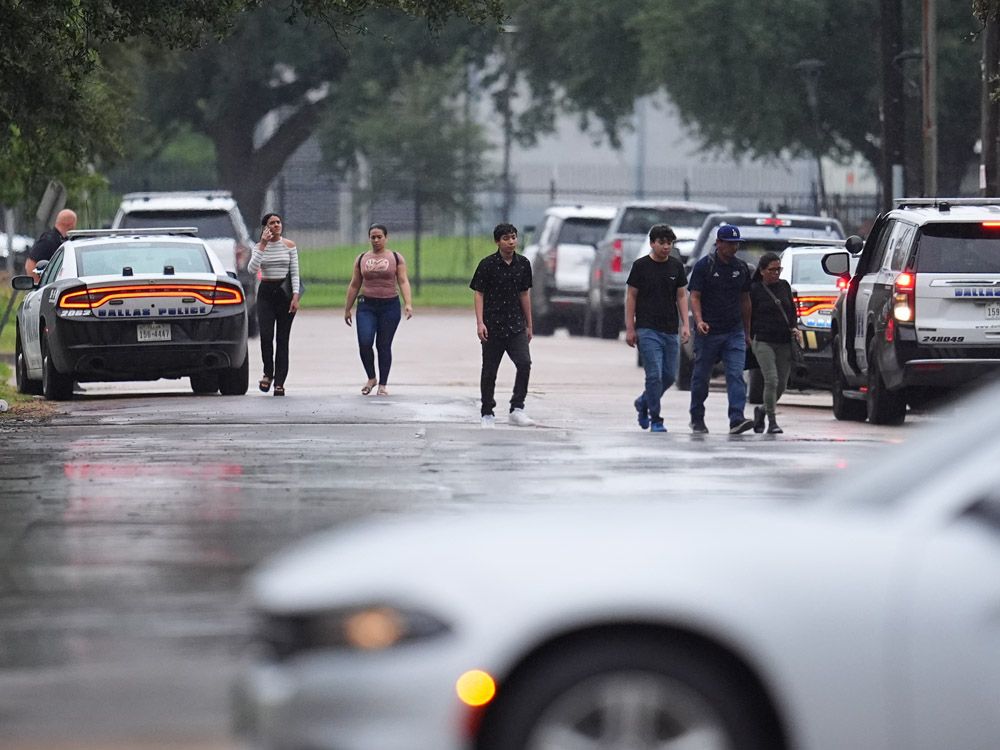 People who had appointments at a U.S. Immigration and Customs Enforcement office are turned away after a reported shooting in the facility in Dallas on Wednesday, Sept. 24, 2025. 