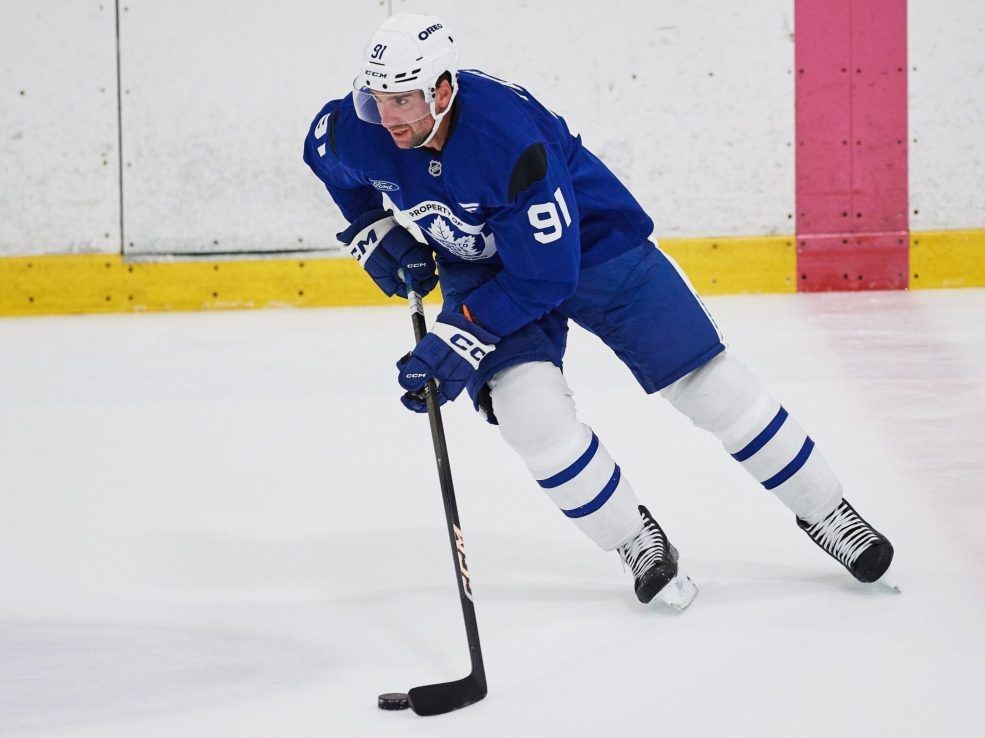 Maple Leafs forward John Tavares sprints down the ice during the opening week of the team's NHL training camp in Toronto, Thursday, Sept. 18, 2025.
