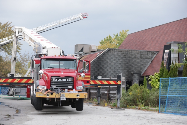  Toronto Fire investigate a fire that sparked at 5:44 a.m. at the Rally Sports Bar & Smokehouse located on the East-York North York border off of O’Connor Dr. and Northline Rd. on Monday September 22, 2025.