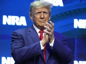 Then former U.S. President Donald Trump speaks to guests at the 2023 NRA-ILA Leadership Forum in Indianapolis, April 14, 2023.
