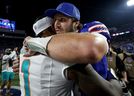 Buffalo Bills quarterback Josh Allen hugs Miami counterpart Tua Tagovailoa after the Bills' NFL victory over the Dolphins.