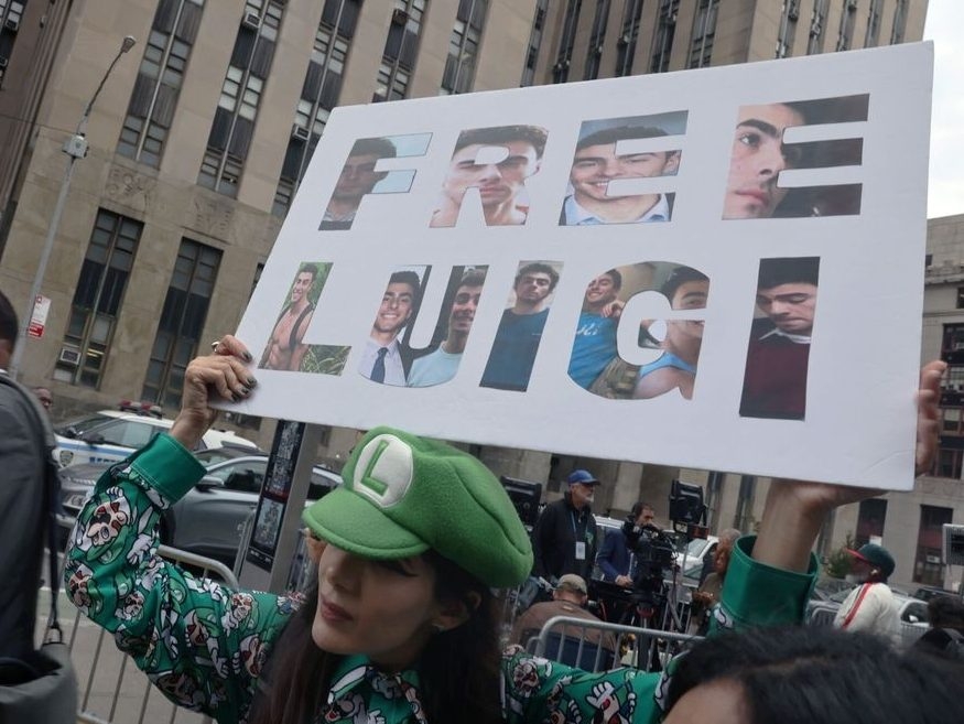 Supporters of Luigi Mangione gather following a pretrial hearing at New York State Supreme Court in New York in September 2025. Supporters of Luigi Mangione gather following a pretrial hearing at New York State Supreme Court in New York in September 2025.