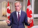 Prime Minister Mark Carney speaks to the media, at the Liberal Cabinet Retreat, in Toronto, Wednesday, Sept. 3, 2025.