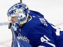 Toronto Maple Leafs goaltender Anthony Stolarz (41) takes a slap shot off the mask during first period, round two, game one NHL Stanley Cup playoff hockey action against the Florida Panthers in Toronto on Monday, May 5, 2025.