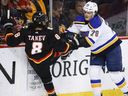 Sammy Blays, the then member of the Blues of St. Luis, checks the then defender of the flame Chris Tanev during the game in 2024.