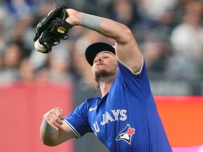 Toronto Blue Jays third baseman Addison Barger drops a fly ball hit by New York Yankees' Austin Wells during ALDS Game 3.
