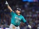 Josh Naylor of the Seattle Mariners celebrates after hitting a double home run against the Toronto Blue Jays in Game 2 of the ALCS.
