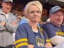 Milwaukee Brewers fan Shannon Kobylarczyk lost her job after threatening a Dodgers fan.