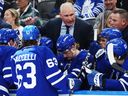 Maple Leafs head coach Craig Berube talks to players during a timeout against the Nashville Predators.