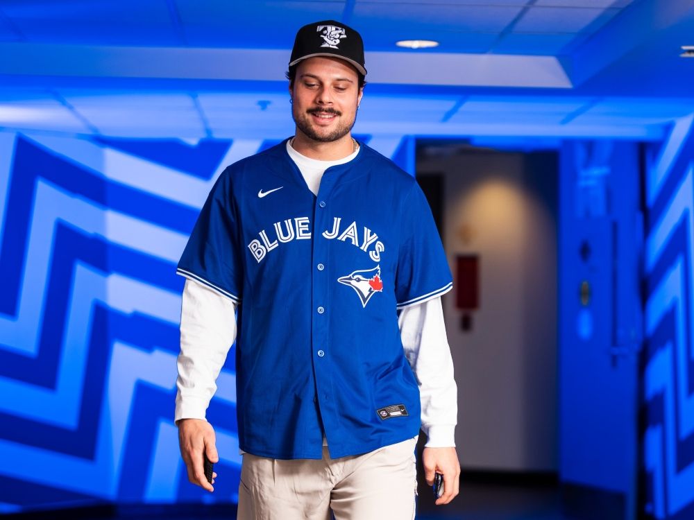 Leafs captain Auston Matthews wears a Vladimir Guerrero Jr. Blue Jays jersey.