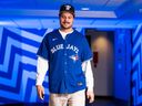 Leafs captain Auston Matthews wears a Vladimir Guerrero Jr. Blue Jays jersey.