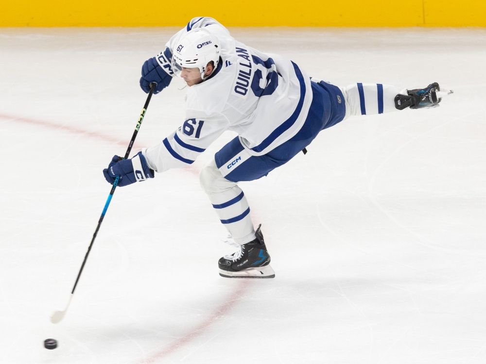 Toronto Maple Leafs player Jacob Quillan takes a shot on goal during a pre-season game against the Montreal Canadiens.